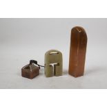 A Chinese amber soapstone seal and another smaller, together with a double seal blank, largest 6"