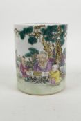 A Chinese famille verte porcelain brush pot decorated with a Go master teaching children to play,