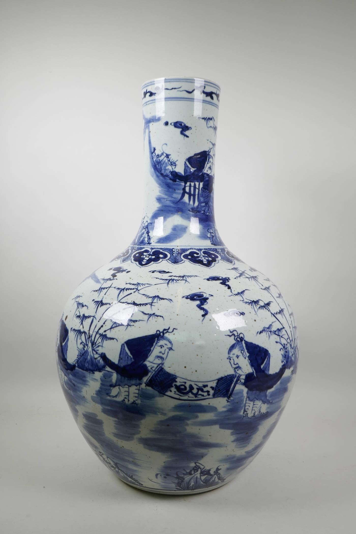 A large Chinese blue and white pottery bottle vase decorated with old bearded men in a garden, 23" - Image 4 of 5