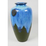 A studio pottery vase with blue and green drip glaze, 13" high