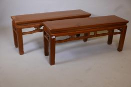 A pair of Chinese hardwood low tables, 45" x 12½? x 19" high