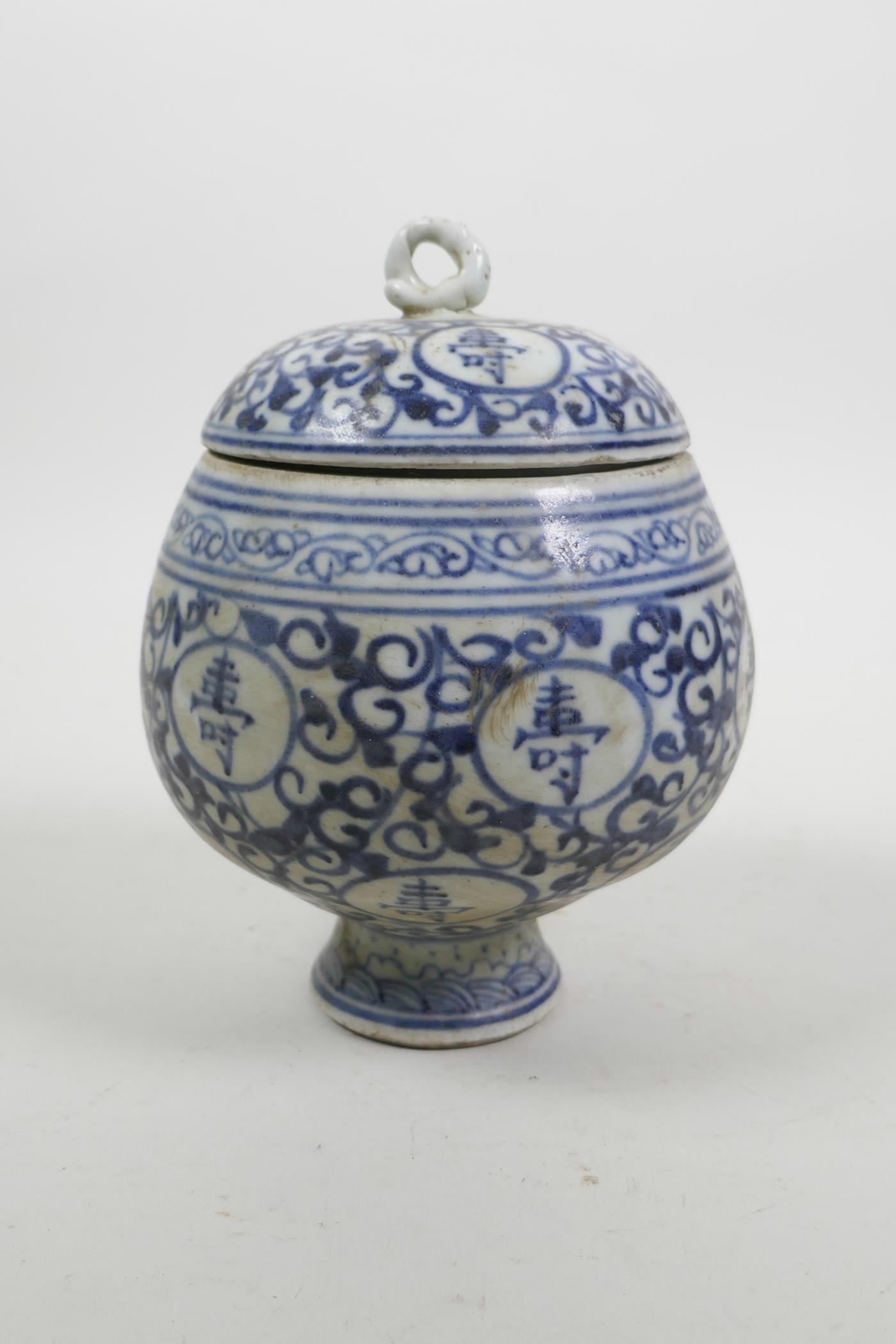 A Chinese blue and white porcelain bulbous pot and cover with all over auspicious character