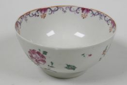 A C19th Chinese porcelain rice bowl painted with flowers and insects, 4¼" diameter, A/F