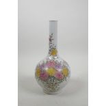 A Chinese polychrome porcelain bottle vase decorated with chrysanthemums, seal mark to base, 10"