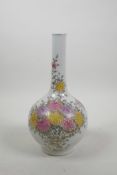 A Chinese polychrome porcelain bottle vase decorated with chrysanthemums, seal mark to base, 10"