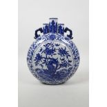 A Chinese blue and white porcelain triple stem moon flask with two handles, decorated with bats