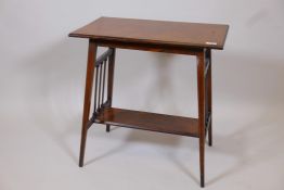 A Victorian two tier rosewood occasional table, raised on splay tapered supports, 24" x 15" x 25"