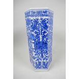 A Chinese blue and white porcelain hexagonal straight vase, with panels featuring dragons and