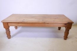 A pine farmhouse style coffee table, 56" x 24" x 18" high