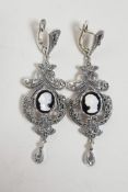 A pair of 925 silver and marcasite drop earrings set with cameo portraits, 2½" drop