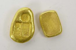 Two Chinese gilt metal trade tokens/ingots, 2" long