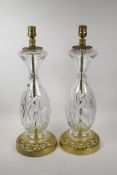 A pair of French glass and brass table lamps, 29" high