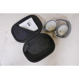 A pair of Bose Quiet Comfort 35 Bluetooth headphones in case