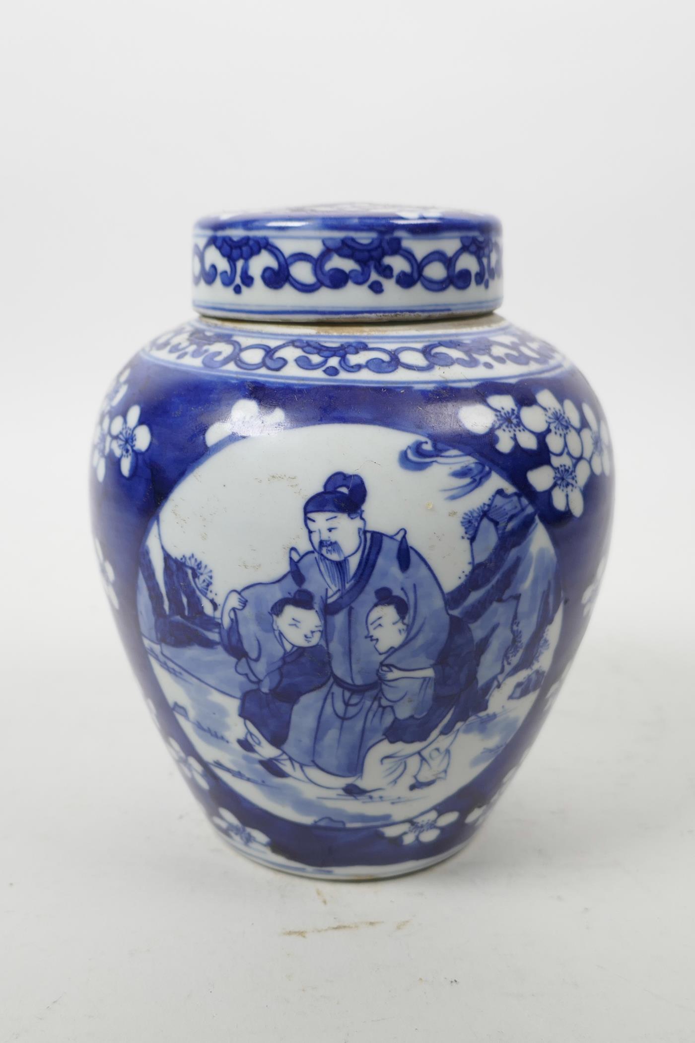 A Chinese blue and white ginger jar and cover decorated with figures in a landscape, on a cracked