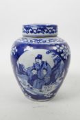 A Chinese blue and white ginger jar and cover decorated with figures in a landscape, on a cracked