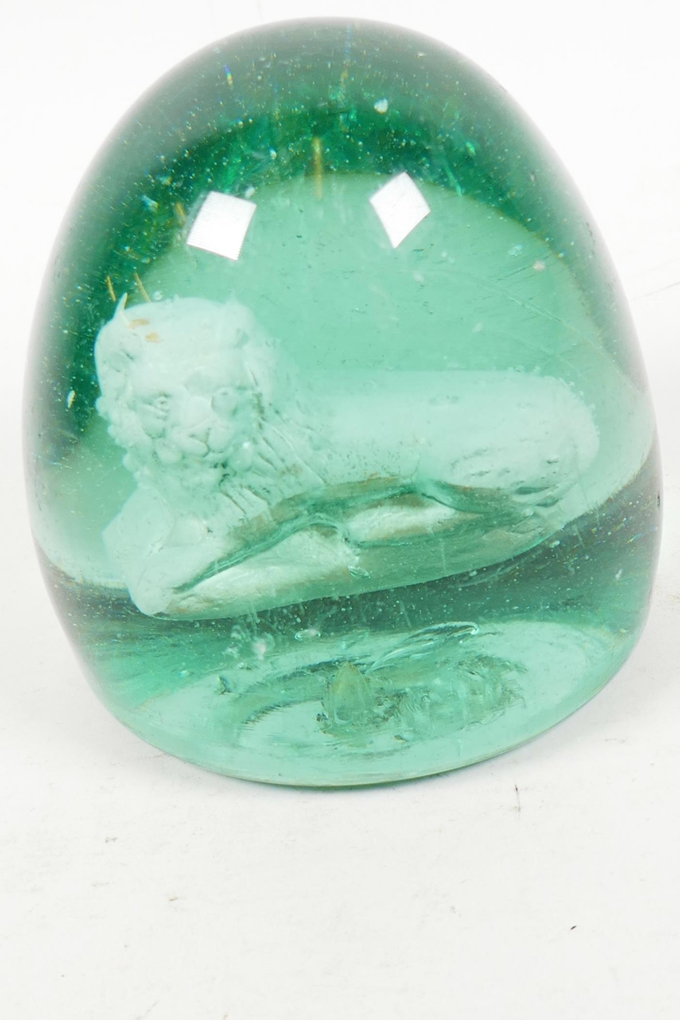 A heavy C19th green glass dump with interior sulphide of a lion, 3½" diameter, 4" high - Image 2 of 4