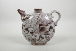 A Chinese red and white porcelain phoenix flask, 7" high