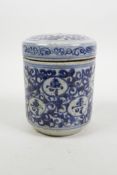 A Chinese blue and white porcelain cylinder pot and cover, with all over auspicious character