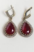 A pair of 925 silver and gilt metal teardrop earrings set with cubic zirconium and red semi-precious