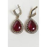 A pair of 925 silver and gilt metal teardrop earrings set with cubic zirconium and red semi-precious