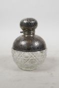 A dimpled, silver topped moulded glass scent bottle, Chester 1908, 4½" high