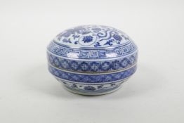 A Chinese blue and white porcelain box and cover, decorated with phoenix and lotus flowers, 6