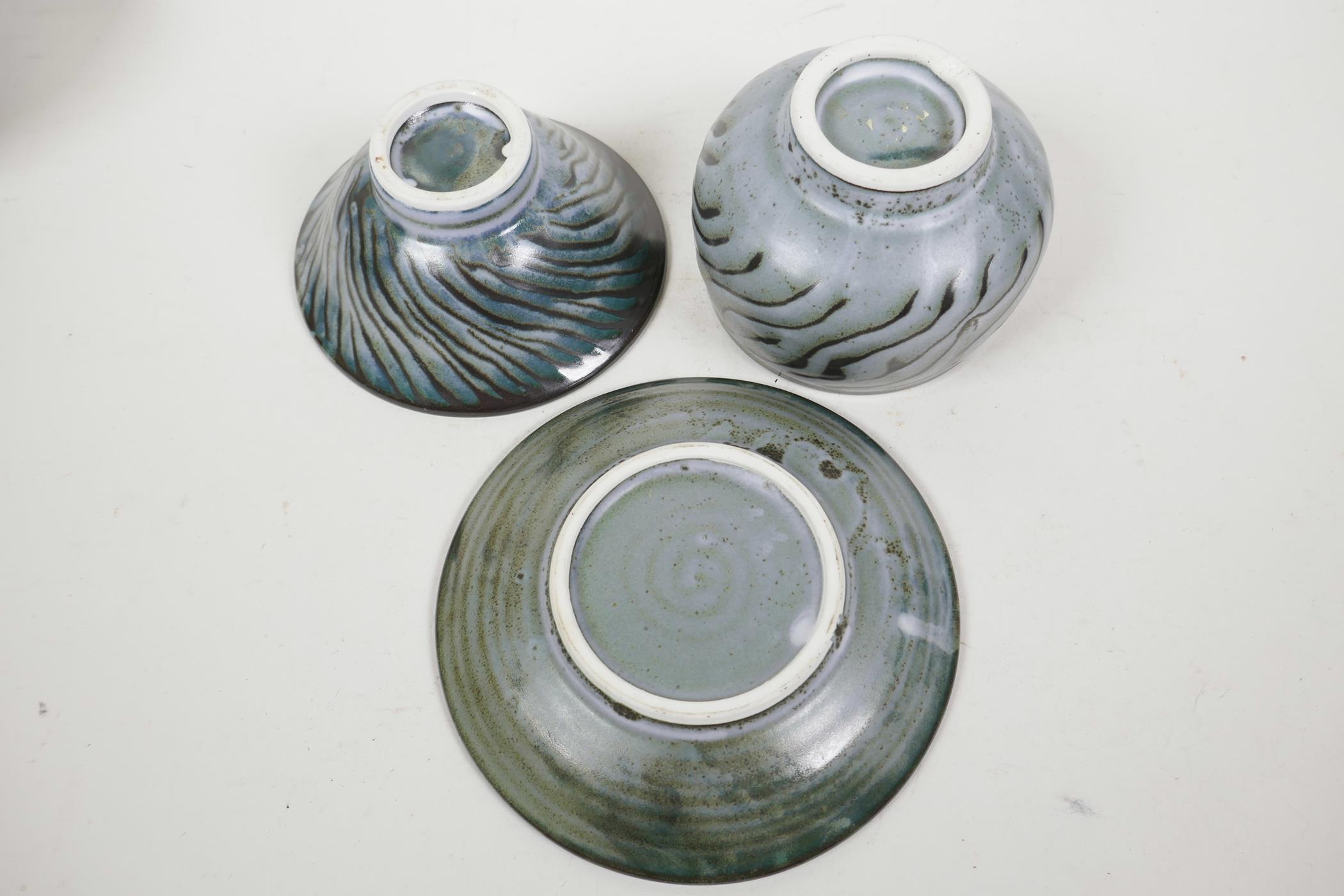 Studio pottery, two bowls and a shallow dish, slip glazed in grey/blue and brown, dish 6½" diameter - Image 5 of 5