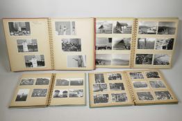 Four Japanese mid century photograph albums of socio-historical interest, 7½" x 11½"