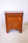A late C19th Dutch oak side cupboard with tulipwood quartered veneer, canted corners and brass