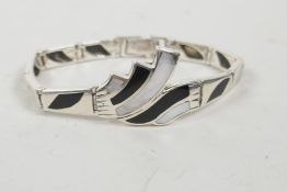 A 925 silver Art Deco style bracelet set with mother of pearl and black enamel, 7" long