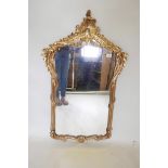 A Louis XV style Italian gold leaf mirror, with intricately moulded gilt frame, 41" x 24"