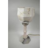 An Art Deco alabaster table lamp, with an original carved alabaster shade mounted on a column