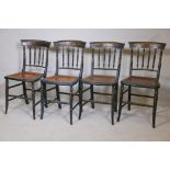 A set of four Regency painted and parcel gilt decorated side chairs, with cane seats, raised on