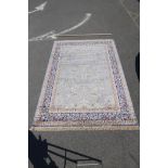 A Kashmiri duck egg blue ground carpet with all over tree of life design, 93" x 132"