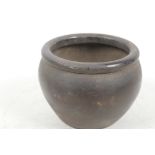 A small Chinese bronze jar, 3½" high, 4" diameter