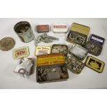 A box of vintage tins and detectorist finds