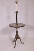 A brass and fossiled marble occasional table/standard lamp, 45½" high