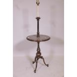 A brass and fossiled marble occasional table/standard lamp, 45½" high