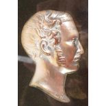 A C19th coppered profile bust of Prince Albert, 3" long, framed