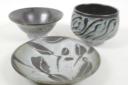 Studio pottery, two bowls and a shallow dish, slip glazed in grey/blue and brown, dish 6½" diameter