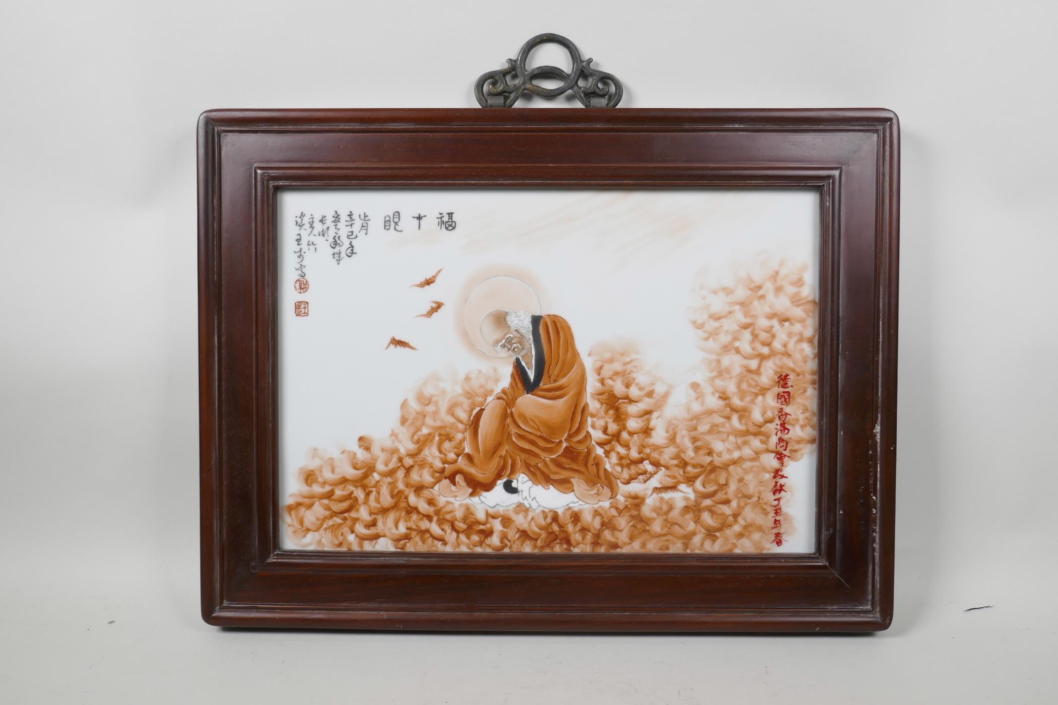 A Chinese polychrome porcelain panel decorated with Lohan in red robes, in a hardwood frame, 17½" - Image 5 of 5