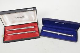 A Sheaffer fountain pen together with a Parker ball point pen and pencil set