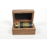 A reproduction brass 'Victorian Marine Telescope', boxed, 3½" x 2½"