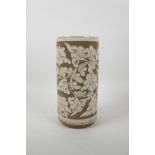 A Chinese Cizhou pottery sleeve vase with chased lotus flower decoration, 10" high x 5" diameter