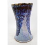 A studio pottery vase with dark over pale blue drip glaze, impressed mark to base, 9¼" high