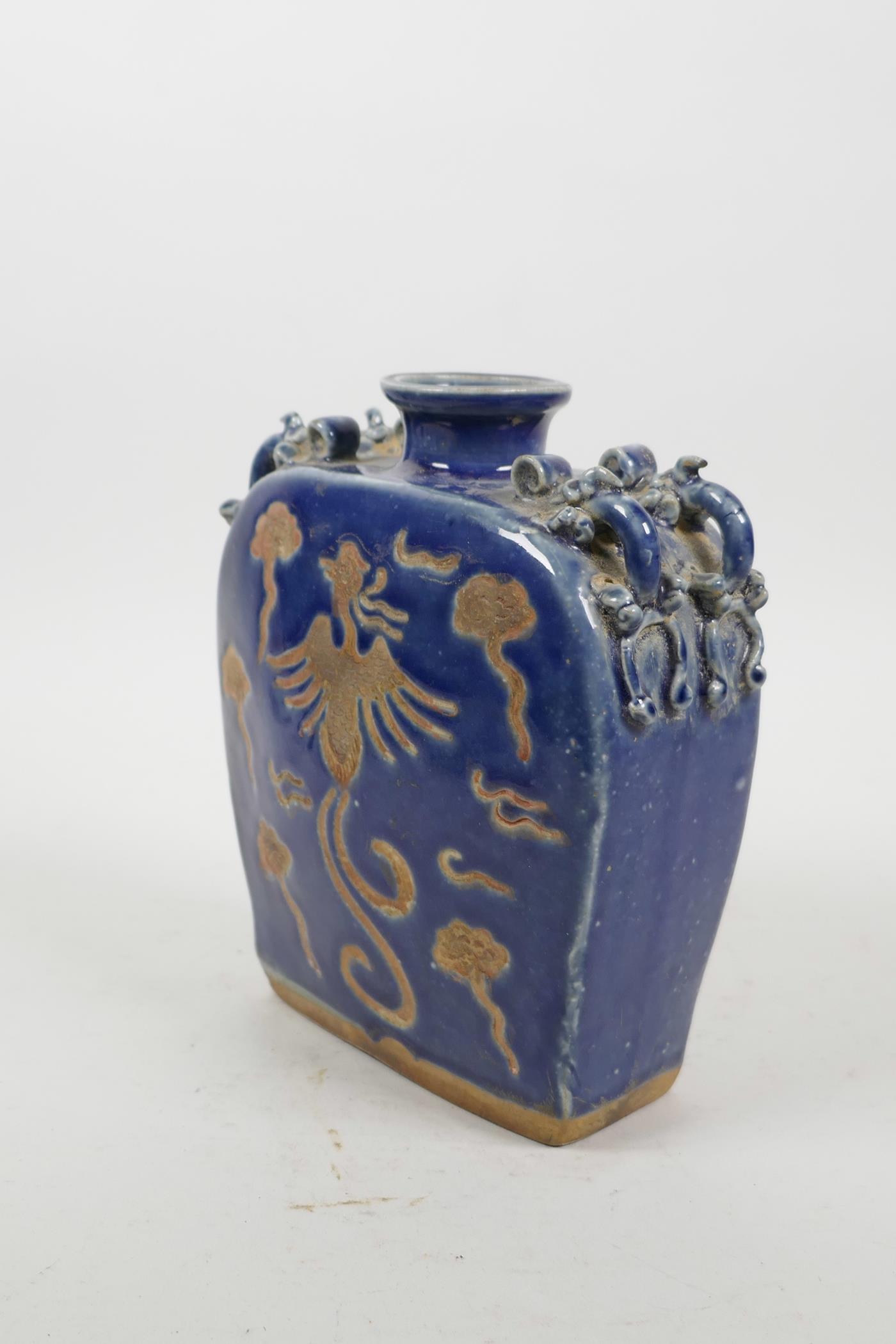 A Chinese blue glazed pottery flask with four dragon shaped handles and chased phoenix decoration, - Image 2 of 3