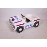 A child's pedal police car, A/F, 33" x 18"