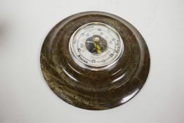 A Cornish serpentine cased aneroid barometer, 7½" diameter