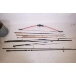 A Geologic Discovery 100 bow, 53½" long, together with six fishing rods