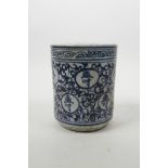 A Chinese blue and white porcelain brush pot with all over auspicious character decoration, 5"